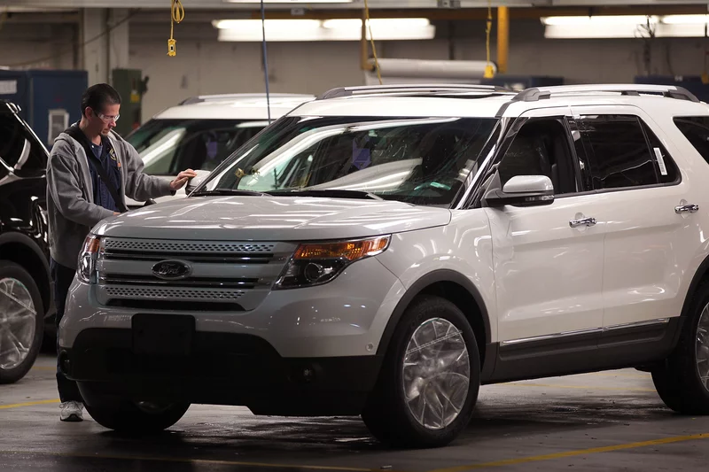 Ford Explorer being examined on the factory line
