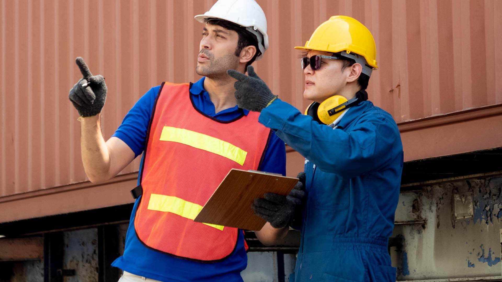 A foreman showing an independent contractor the job site